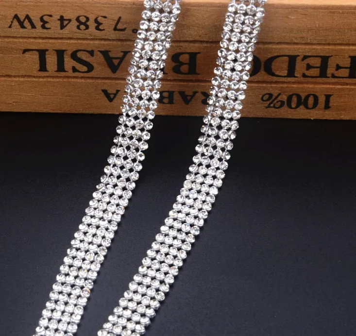 

Free ship,2mm crystal clear diamond rhinestone banding,4 rows/pcs,width 1cm,fancy wedding dress belt trimming,decorative tape