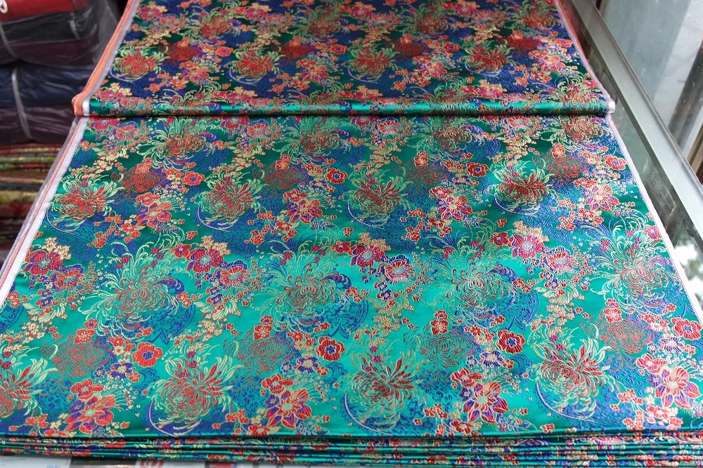 Китайская шелковая парча тканая Дамасская ткань для пошива Чонсам Подушка изумрудно-зеленая задняя часть с красочные маргаритки шаблон цвет матч