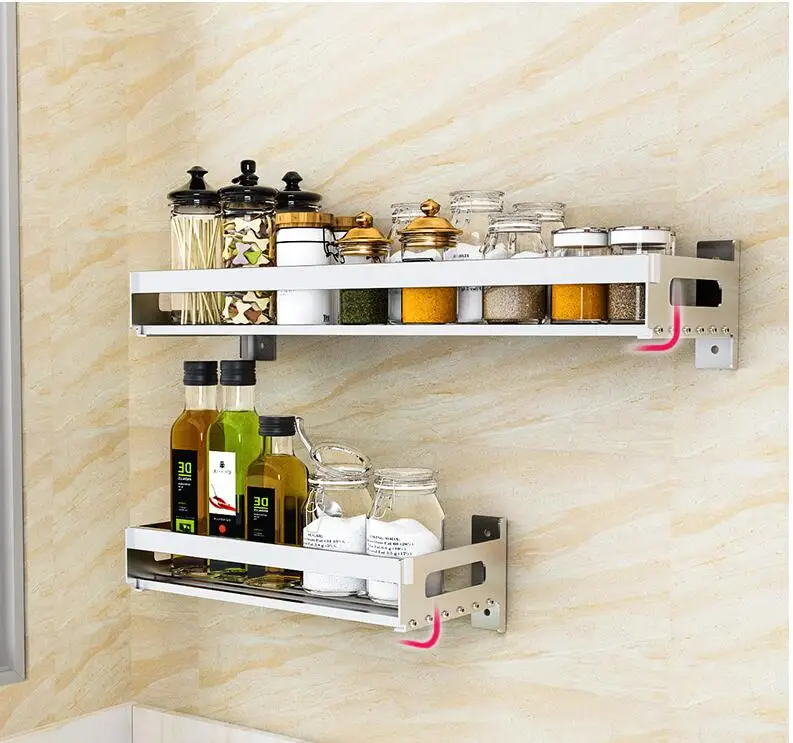 The kitchen condiments buy the thing to wear the wall to hang 304 stainless steel to avoid to punch the condiment box to receive