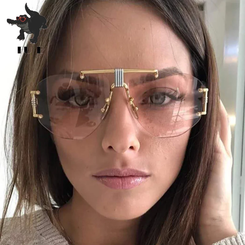 Goede FU E 2019 Mode Frameloze zonnebril Dames Nieuwe Merk Designer Punk Grote Frame Glazen Retro zonnebril Mannen UV400 Oculos de sol