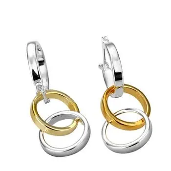 картье серьги 2022. серьги три кольца. серьги картье три золота. металлические серьги кольца. золотые сережки кольца.