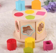 Juguete de madera para ensartar y apilar