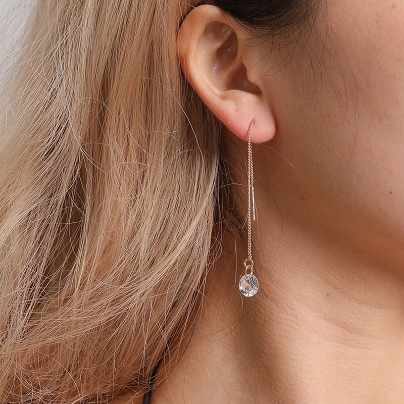 Серьги длинные. Серьги длинные висячие с камнями. Серьги висят. Модные висячие серьги. Серьги висячие.