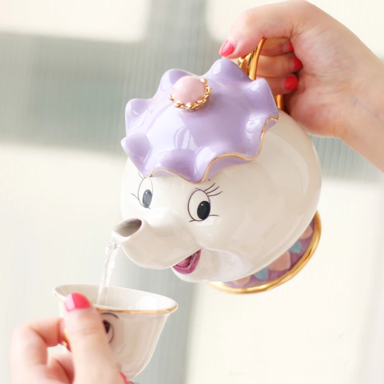 Beauty and the Beast Gilded Ceramic teapot and cup Mrs. Potts Chip