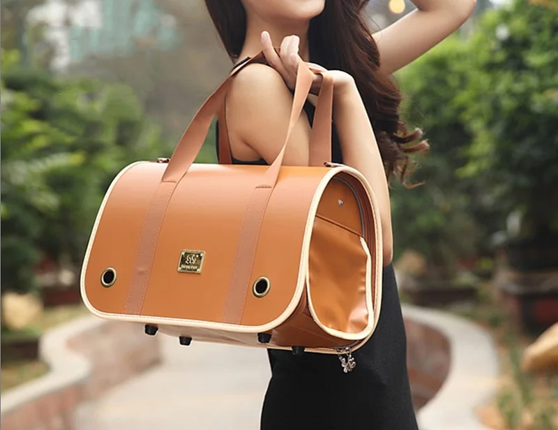 X20_PU_Leather_Pet_Dog_Carrier_Bag_Breathable_Portable_Travel_Dog_Carrier_Handbag_Puppy_Dog_Cat_Carrier_Bag_Waterproof (1)