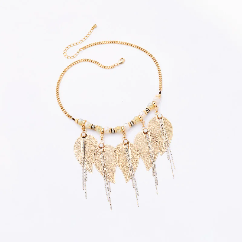 

Boho Hollowed Leaf Drop Earrings Metal Fringe Leaf Pendants Crystal Tassel Necklaces For Women Fashion Jewelry Sets