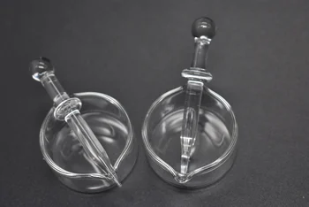 

glass wax container with glass tool smoking oil container