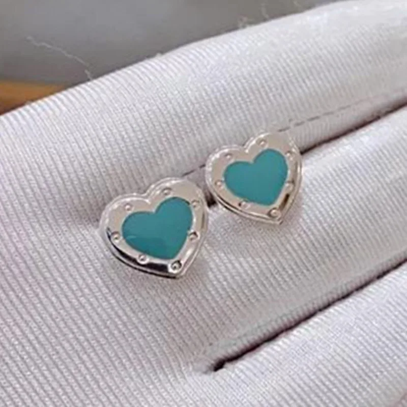 

TIFF 925 Sterling Silver Stud Earrings.Sleek minimalist zircon stars,charm jewelry ladies gift.