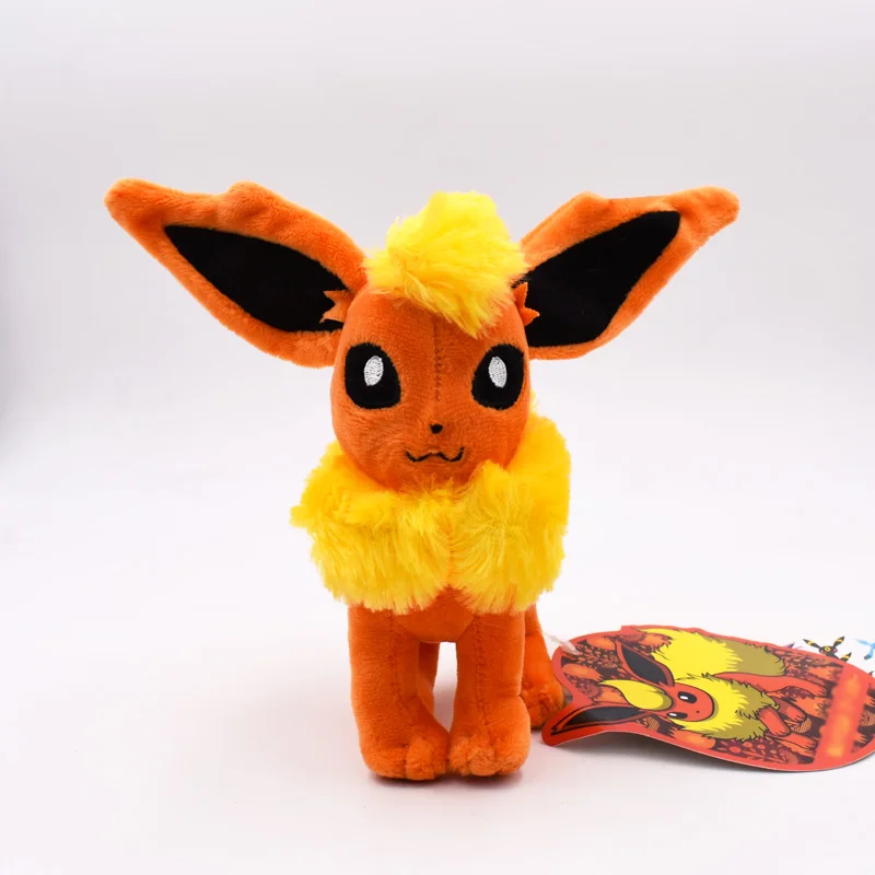 

Free Shipping 17cm Anime Cartoon Eevee Standing Flareon Peluche Soft Stuffed Toy Kids Plush Doll Gift Dolls Kid Present