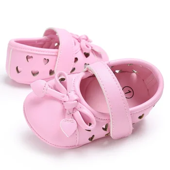 

Cute Girls Princess Shoes Kids Newborn PU Leather Bowknot Hollow Heart-Shaped Soft Soled Anti-Slip Baby Shoes
