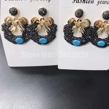 

Black bowknot long pendant elegant temperament earthing color random shipment