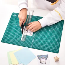 Deli A3 PVC Cutting Mat Cutting Pad Patchwork Cut Pad A3 Patchwork Tools Manual DIY Tool Cutting Board Durable Paper Mat pvc rectangle cutting mat a4 durable selfhealing cut pad patchwork tools handmade diy accessory cutting plate dark green 30 22cm