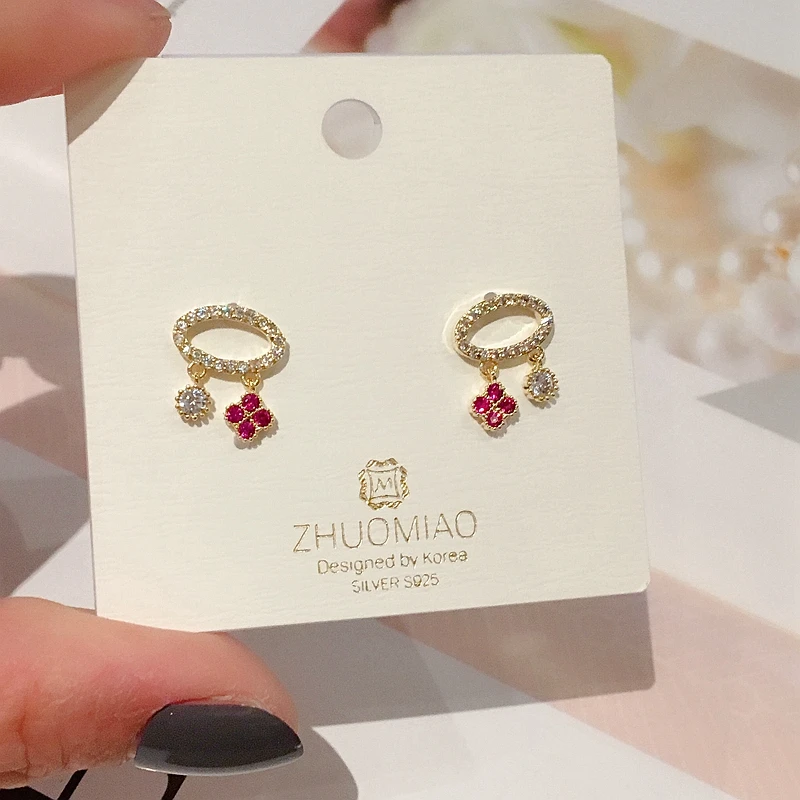 

Exquisite Korean Stud Earrings Gold Color Micro Paved Micro Paved Cubic Zirconia Clover Earrings for Women Girls