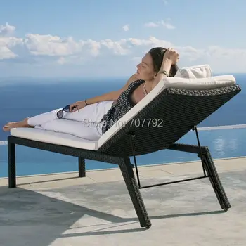 

sunny day seaside outdoor furniture rattan sun loungers