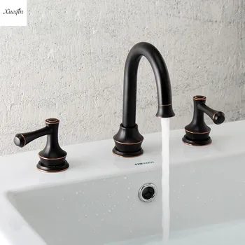 

Vintage Brass ORB/Chrome Fission Basin Faucet Double Handle Two Holes Bathroom Faucet Hot and Cold Water Deck Mounted Mixer Tap