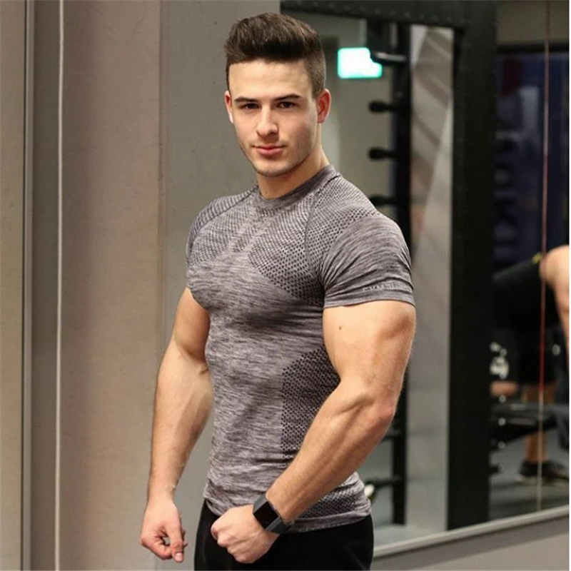 

2019 summer brand men's gym sports training T-shirt new breathable and quick-drying tight short-sleeved fitness T-shirt