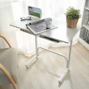 

Lazy mobile lifting. Notebook computer desk.Coffee Tables
