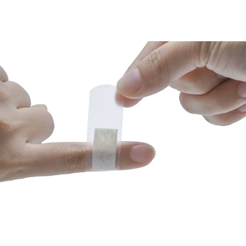 

50pcs/lot Waterproof Medical Bandage Transparent Adhesive Wound Band Aid Medical Treatment Baby Care T0262SHD