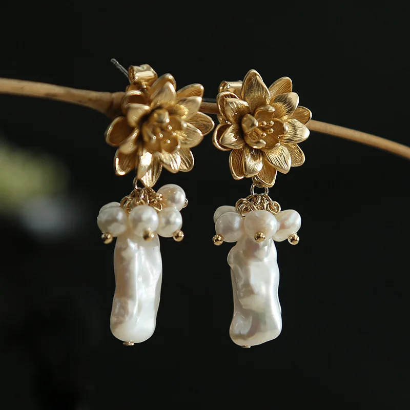 

Natural geometry of special-shaped pearl lotus exaggerated fashion wind stud earrings earrings pendants wholesale