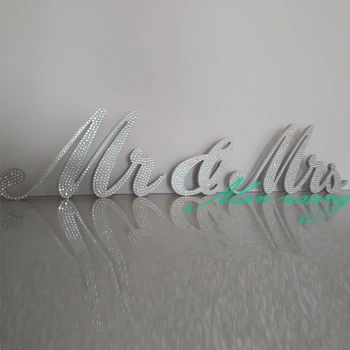 

Mr. and Mrs. Register sweetheart table wedding sign bling of Mr. and Mrs.