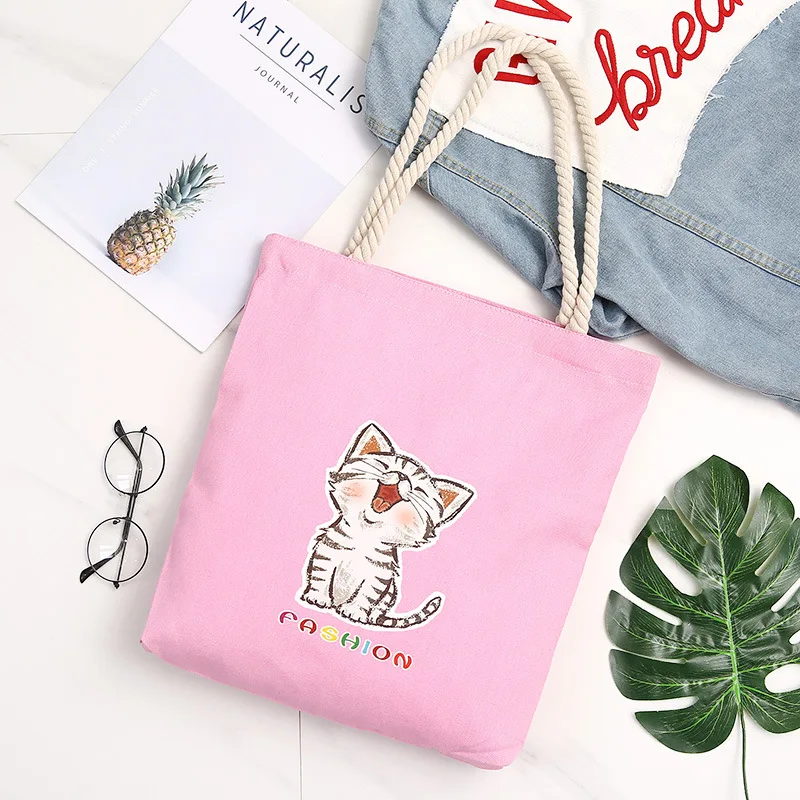 

Korean version of Leisure Canvas one-shoulder bag handbag personality simple Baitao cat large capacity pocket travel student bag