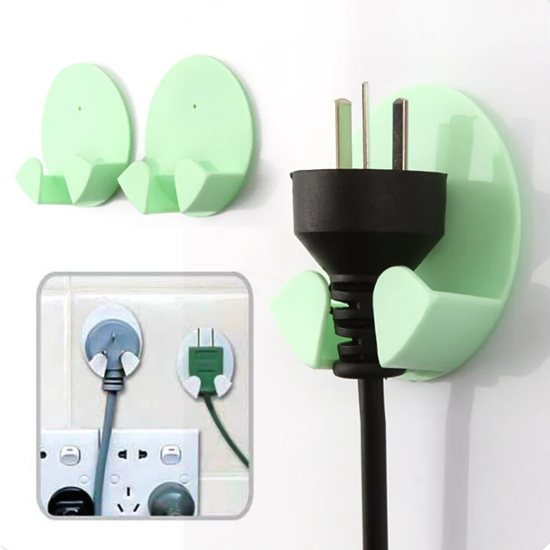 

2pcs/Pack Random Color Home Office Wall Adhesive Plastic Power Plug Socket Holder Hanger Wall Storage Hook Freeshipping