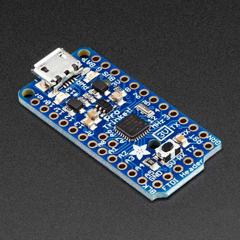 

1 pcs x AVR Pro Trinket 3V 12MHz 38mm x 18mm x 2mm development board with ATmega328P part no. 2010