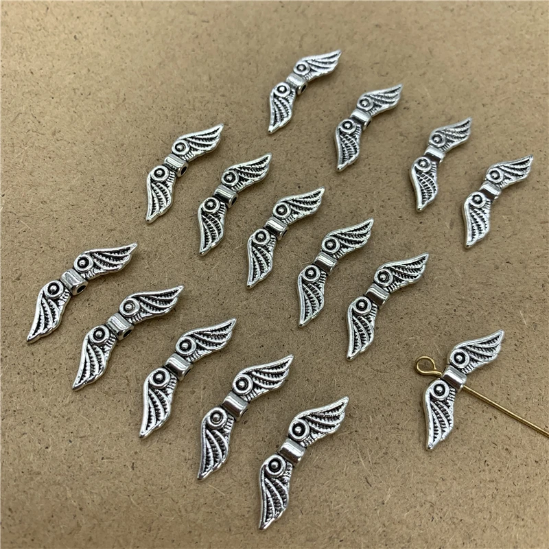

25pcs/Lot 24x4mm "Wing" Shape Alloy Beads Cap Jewelry Findings Charms Necklace Bracelets Spacer Beads For Jewelry Making