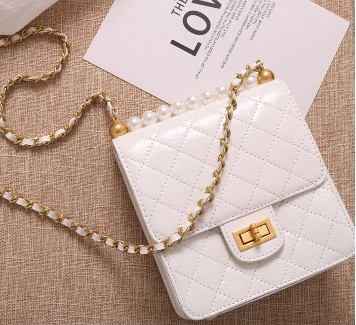 

by H high quality luxury designers genuine leather mini flap bag pearl chain bag womens fashion phone bag party bag pearl clutch