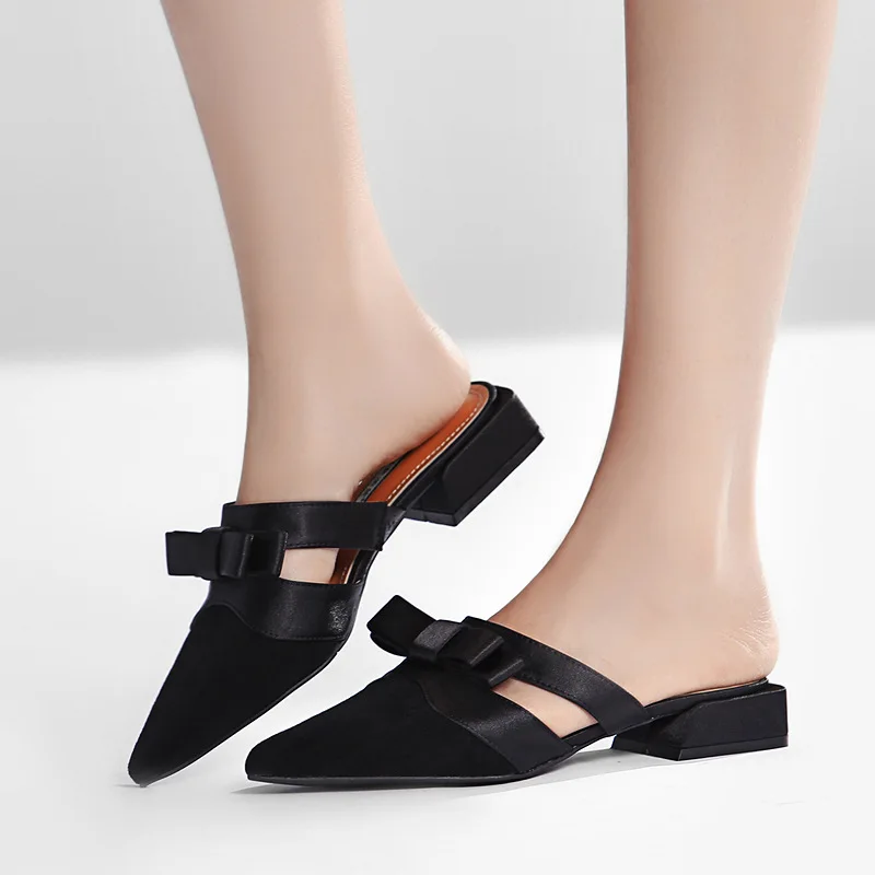 

2019 summer new style simple and simple color matching slippers women bow decorative pointed casual shoes.