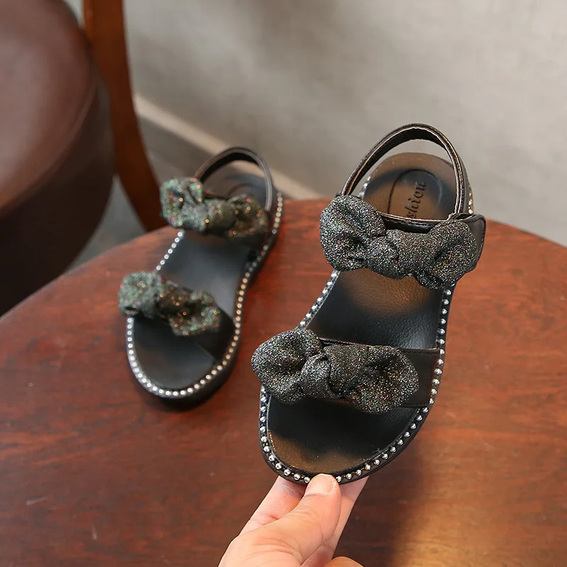 High quality Summer Fashion Girl Sandal Children Girls Flat Rome Sandal Bling Bling bowknot Kids Shoes black silver High quality Summer Fashion Girl Sandal Children Girls Flat Rome Sandal Bling Bling bowknot Kids Shoes black silver