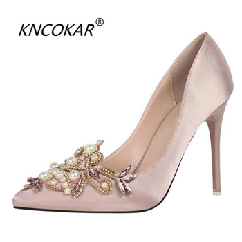 

In 2017, the new fashion craze is a pair of high-heeled pearl pumps with satin shallow-toe heels and nude pink wedding shoes