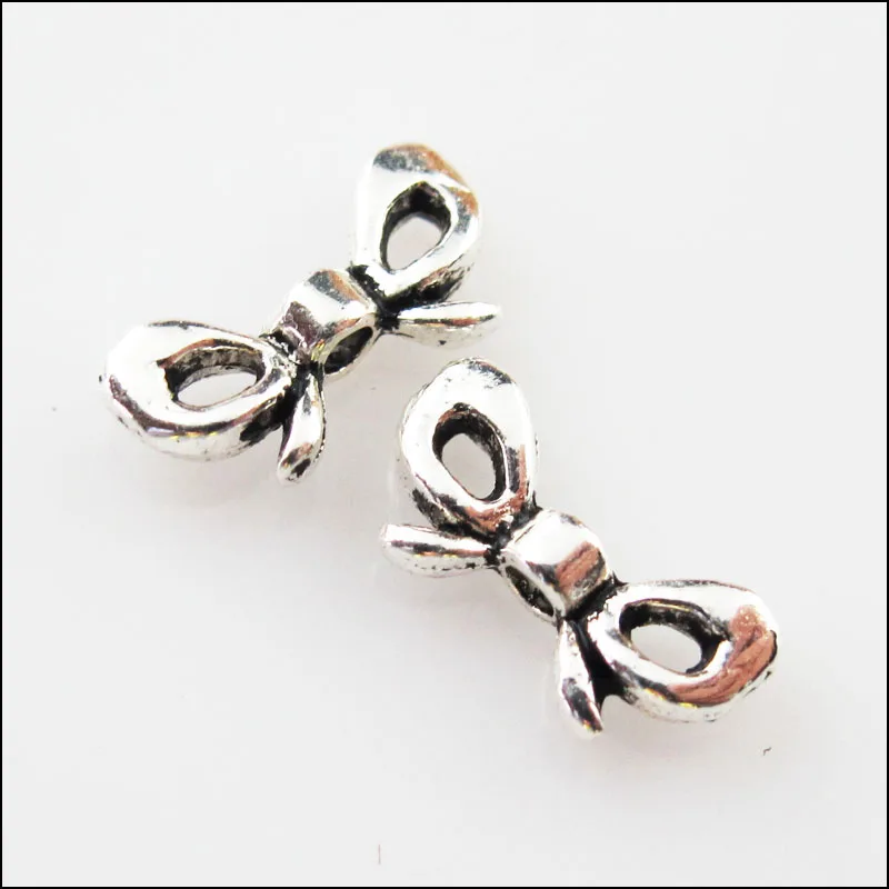 

35Pcs Tibetan Silver Tone Butterfly Knot Spacer Beads Charms 6x12mm