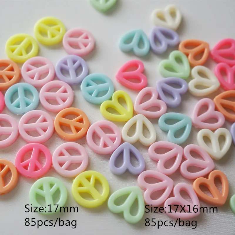 

Meideheng Acrylic Hollow out heart shape Circular anti-war sign pink for Children's jewelry accessories making 17mm 85pcs/bag