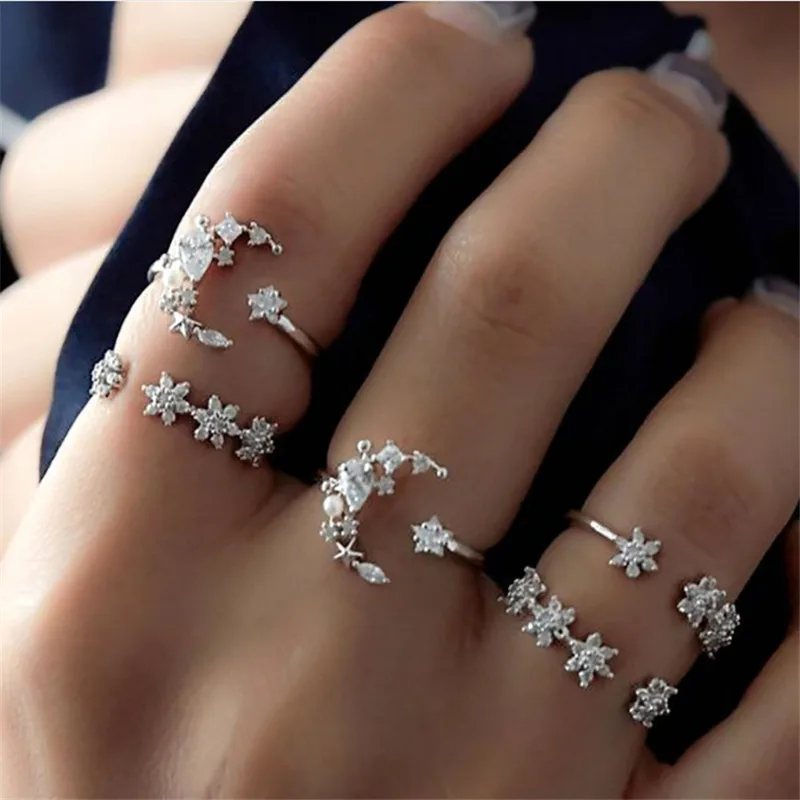 

pack of 5 personality knuckle rings with rhinestone stars and moon design in silver tone