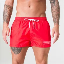 Новые летние мужские фитнес шорты пляж тренажерный зал упражнения Мужские дышащие печати быстросохнущие Спортивная одежда для бега