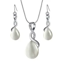 3 Color Waterdrop Resin Stone Crystal Pendant Necklace Earrings Jewelry Set Wedding Bride Jewelry Sets цена 3 Color Waterdrop Resin Stone Crystal Pendant Necklace Earrings Jewelry Set Wedding Bride Jewelry Sets цены онлайн