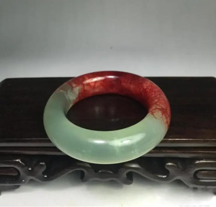 

Chicken blood stone jade safe buckle / jade ring