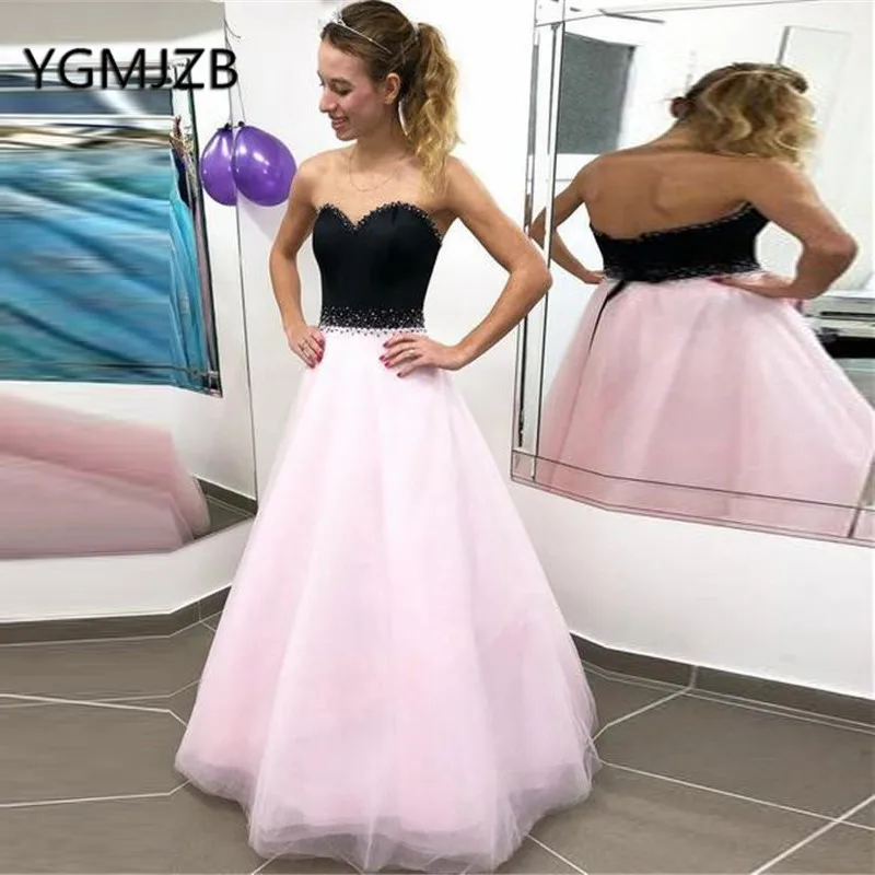 black top pink skirt