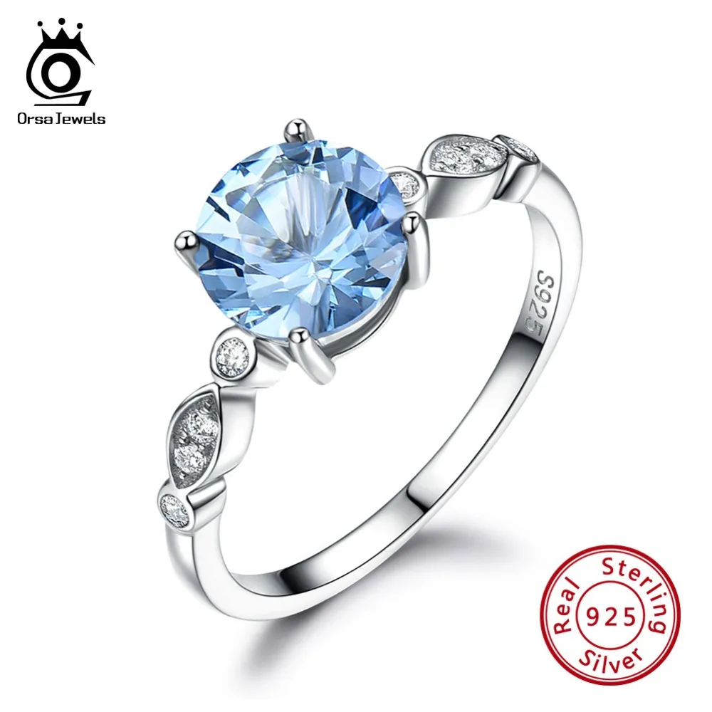

ORSA JEWELS 100% 925 Sterling Silver Rings For Women Natural Blue Topaz Round Shape Female Ring Female Fine Jewelry VSR01