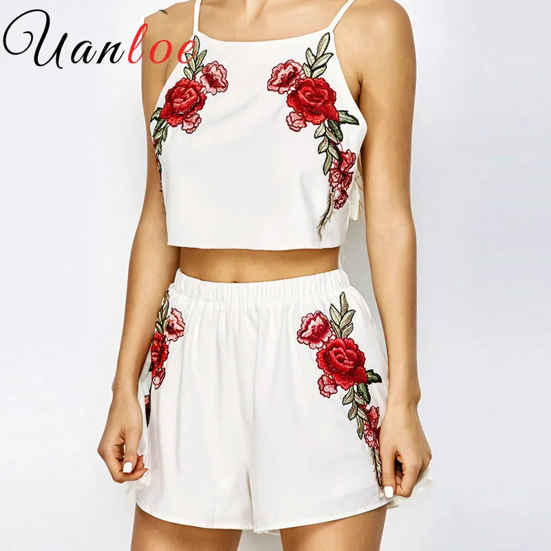 

UANLOE Summer Casual Two Piece Sexy Rose Floral Embroidery White Twinset Crop Top Bowknot Hot Pants Shorts Women Set Tank Beach