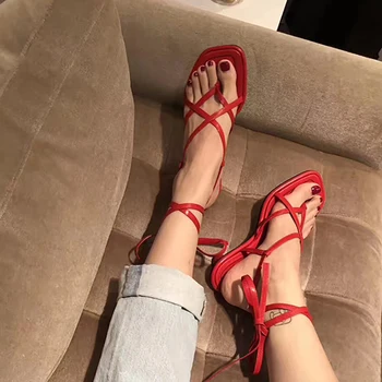 

2019 summer new flat bottom wild toe cross straps sandals female Roman shoes