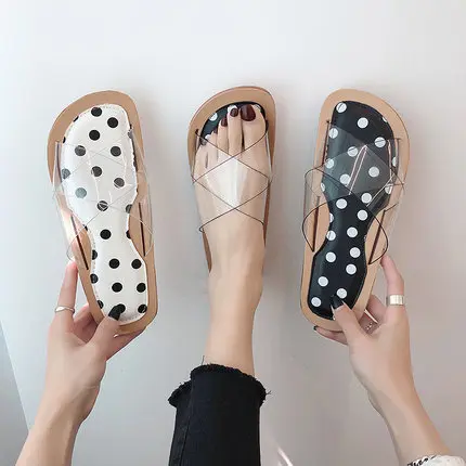 

Slippers women wear flat 2019 new fashion Korean version of the wild transparent wave point crystal plastic beach shoes tide