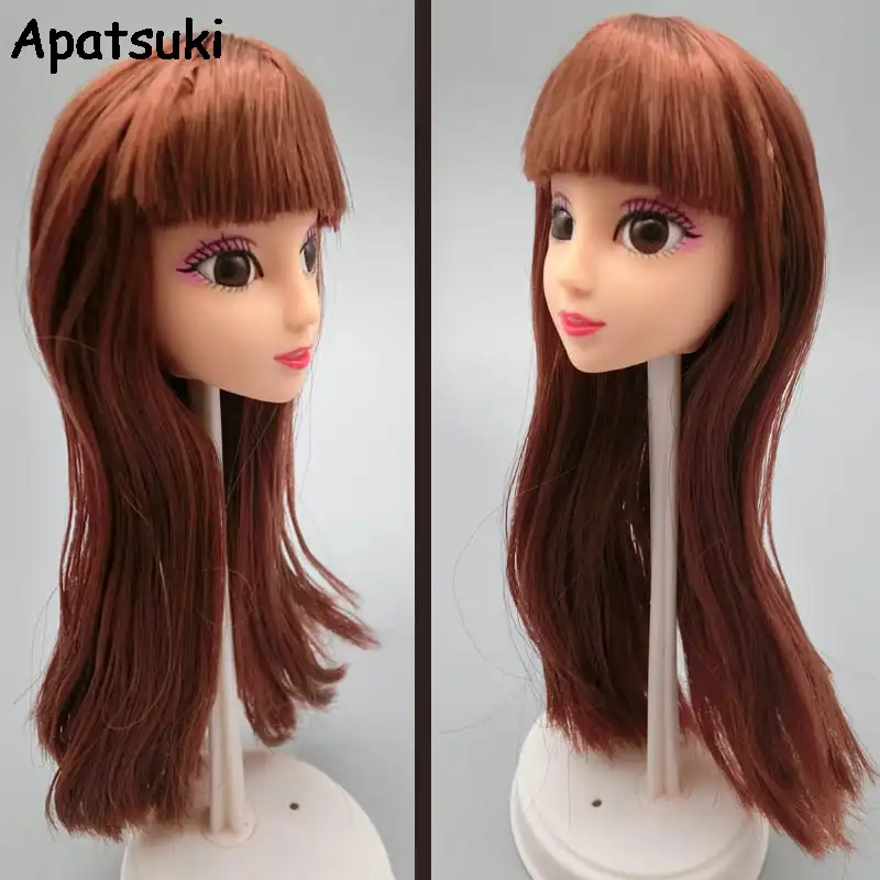 barbie doll with brown hair and brown eyes