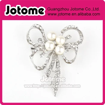 

Wholesale crystal Rhinestone bow brooch with pearl , bow pearl rhinestone Broach pin for wedding invitation