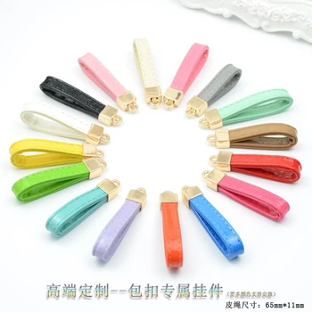 

10PCS 6.5cm Selling high-quality PU wrist rope white key chain pendant DIY creative imitation leather bag hanging decoration acc