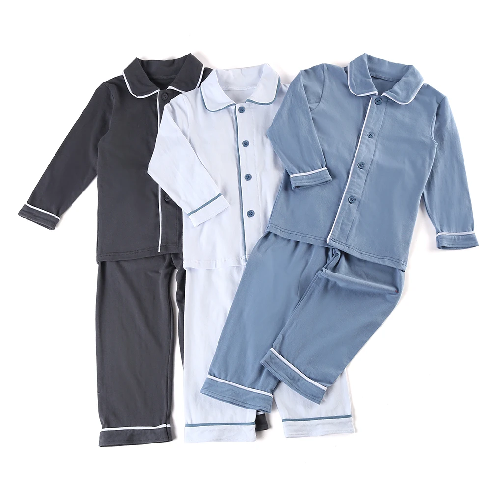 Comprar 100% de algodón niños y niñas ropa de dormir familia a juego niños Navidad volante de color sólido niños Pijamas
