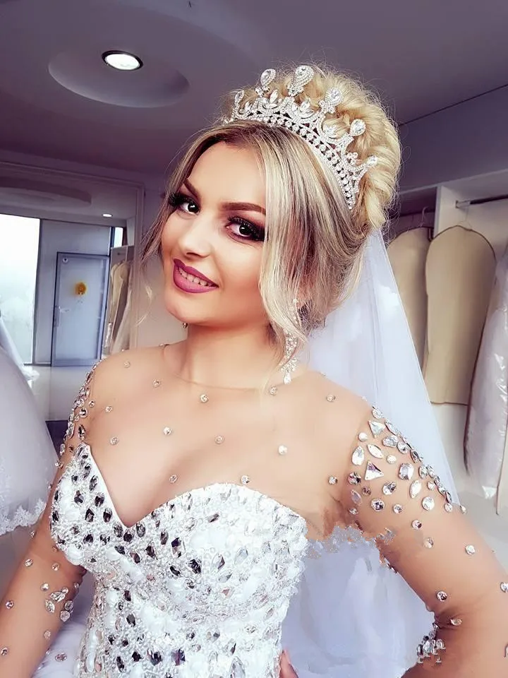 2018-luxury-crystals-beaded-ball-gown-wedding-dresses-sheer-neck-sweetheart-neck-long-sleeve-tulle-princess-plus-size-bridal-gowns_