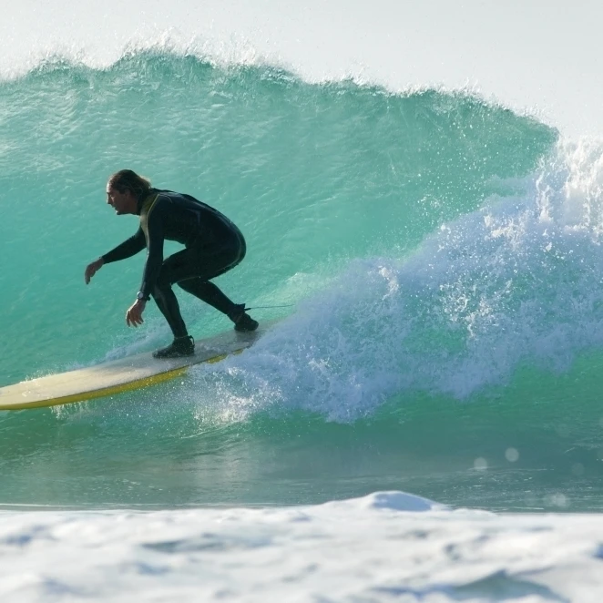Surfer Catching A Wave Poster Print (19 x 12)