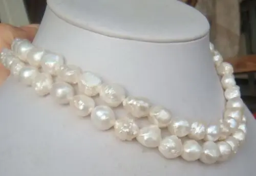 

Free Shipping >>>>>huge baroque 12-13MM SOUTH SEA GENUINE WHITE PEARL NECKLACE 33"14KG